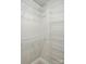 Walk-in closet featuring multiple white wire rack shelves for optimized storage space at 116 Eve Ash Ln, Mooresville, NC 28115