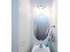 Clean bathroom features a sink, mirror, and modern lighting at 12328 Jessica Pl, Charlotte, NC 28269