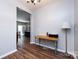 Open dining space featuring wood floors and convenient access to multiple rooms at 12328 Jessica Pl, Charlotte, NC 28269