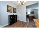 Charming dining area with wood floors, decorative artwork, and easy access to the kitchen at 12328 Jessica Pl, Charlotte, NC 28269
