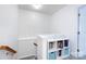 Hallway with open shelving at top of stairs at 12328 Jessica Pl, Charlotte, NC 28269