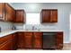 Well-lit kitchen with stainless steel appliances, ample countertop space, and modern finishes at 12328 Jessica Pl, Charlotte, NC 28269