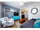 Inviting living room featuring wood floors, comfortable seating, and stylish decor accents at 12328 Jessica Pl, Charlotte, NC 28269