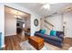 Open living area with wood floors, a staircase, and plenty of natural light at 12328 Jessica Pl, Charlotte, NC 28269