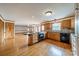 Open kitchen with a center island, stainless appliances, and wooden cabinetry at 12705 Caldwell Rd, Charlotte, NC 28213