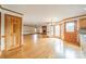 Spacious living room with hardwood flooring, brick fireplace and large windows to let in lots of light at 12705 Caldwell Rd, Charlotte, NC 28213