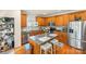 Well-equipped kitchen with stainless steel appliances, granite countertops, and a center island at 128 Sugar Thyme Ln, Mooresville, NC 28115