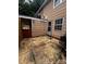 Enclosed patio provides a private outdoor space, featuring a gate, storage, and partial roof at 1300 Larchmont Pl, Salisbury, NC 28144