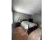 Comfortable bedroom with neutral walls, carpeted floor, and classic furnishings at 1300 Larchmont Pl, Salisbury, NC 28144