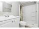 Bathroom with walk-in shower, neutral walls, white vanity, and modern fixtures at 1310 Glasscock Rd, Rock Hill, SC 29730