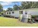 Home featuring a quaint front porch with classic white siding and black shutters, perfect for relaxing at 1310 Glasscock Rd, Rock Hill, SC 29730