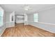 Bright living room featuring natural light, neutral paint, and wood flooring, creating a warm and inviting atmosphere at 1310 Glasscock Rd, Rock Hill, SC 29730