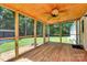 View of a cozy screened-in porch featuring natural wood finishes and ample space for outdoor enjoyment at 1310 Glasscock Rd, Rock Hill, SC 29730