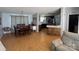 Open-concept dining area with a table, seamlessly connects to the kitchen and living spaces at 13211 Asbury Chapel Rd, Huntersville, NC 28078