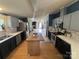 Open kitchen featuring black appliances and ample counter space overlooking the living areas at 13211 Asbury Chapel Rd, Huntersville, NC 28078