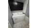 Laundry room with washer and dryer and black cabinets at 13211 Asbury Chapel Rd, Huntersville, NC 28078