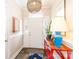 This home's entryway features tile flooring, a red table, and a decorative light fixture at 133 Upland Dr, Statesville, NC 28625