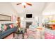 The open living room features a fireplace, backyard access, and views of the dining area at 133 Upland Dr, Statesville, NC 28625
