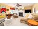 Inviting living room featuring a cozy fireplace, plush seating, and bright, neutral decor, perfect for relaxation at 133 Upland Dr, Statesville, NC 28625
