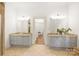Bathroom with double vanity, granite countertops, and tiled floors at 1417 The Plz, Charlotte, NC 28205