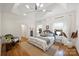 A bright main bedroom with tray ceiling and ample natural light at 1417 The Plz, Charlotte, NC 28205