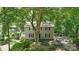Charming two-story home with gray siding, black shutters, and mature landscaping at 1517 E Barden Rd, Charlotte, NC 28226