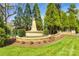 Stone monument with 'River Pointe' inscription, surrounded by lush landscaping and manicured lawns at 16527 Woolwine Rd, Charlotte, NC 28278