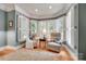 Cozy sitting area with lots of natural light, comfortable seating, and neutral colors at 16527 Woolwine Rd, Charlotte, NC 28278