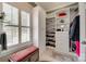Organized walk-in closet with custom shelving and natural light at 16527 Woolwine Rd, Charlotte, NC 28278