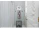 Bright bathroom featuring a towel rack, framed art, stool, and privacy door at 17719 Springwinds Dr, Cornelius, NC 28031