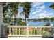 Scenic lake view from the property, featuring clear water and lush greenery at 17719 Springwinds Dr, Cornelius, NC 28031