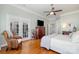 Bedroom with hardwood floors and French doors that lead to an outside deck at 17719 Springwinds Dr, Cornelius, NC 28031