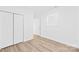 Bright bedroom with a modern feel with ample closet space and wood-look floors at 221 Reliance Rd, Kings Mountain, NC 28086