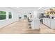 Bright, modern kitchen with an island featuring bar seating and stainless steel appliances at 221 Reliance Rd, Kings Mountain, NC 28086