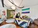 Bedroom with colorful décor, chandelier, and a unique accent wall at 2526 Sherwood Ave, Charlotte, NC 28207