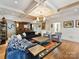 Elegant living room featuring coffered ceilings, stylish furnishings, and a built-in bar area at 2526 Sherwood Ave, Charlotte, NC 28207