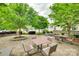 Charming community outdoor space with seating, trees, and a peaceful ambiance at 318 Willow Wood Ct, Matthews, NC 28104