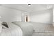 This main bedroom provides natural light, and is connected to the main bathroom at 32612-B Millingport Rd # 7157, New London, NC 28127
