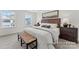 The main bedroom boasts natural light and neutral tones with a stylish decor at 32612-B Millingport Rd # 7157, New London, NC 28127