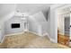 Lofted bonus room features neutral walls, carpet flooring, a view of trees, and a tv at 3324 Greenhurst Dr, Matthews, NC 28104