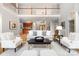 Bright living space with hardwood floors, comfortable seating, and an adjacent wet bar area at 3324 Greenhurst Dr, Matthews, NC 28104