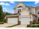 Charming townhome with a two-car garage, brick accents, and well-manicured landscaping at 44409 Oriole Dr # 200, Indian Land, SC 29707