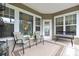 Cozy covered patio with comfortable seating and a view of the outdoors, perfect for relaxation at 44409 Oriole Dr # 200, Indian Land, SC 29707