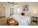 A well-lit bedroom features a neutral color palette and an inviting layout at 4754 Hedgemore Dr # E, Charlotte, NC 28209