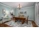 Elegant dining room featuring hardwood floors, a wooden table, and an open design at 506 Academy St, Mcadenville, NC 28101
