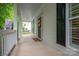 A side view of a covered front porch featuring white columns at 506 Academy St, Mcadenville, NC 28101