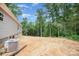 The home's spacious backyard features plenty of room for activities or gardening at 5090 Beaver Dam Way, Bessemer City, NC 28016