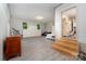 Large finished basement with gray flooring, storage and access to the outside at 524 Heritage Vw, Indian Trail, NC 28079