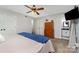 Serene bedroom with ceiling fan, view to ensuite, and comfortable bed at 524 Heritage Vw, Indian Trail, NC 28079