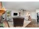 Bright living room with hardwood floors, neutral walls, and a cozy seating arrangement at 524 Heritage Vw, Indian Trail, NC 28079